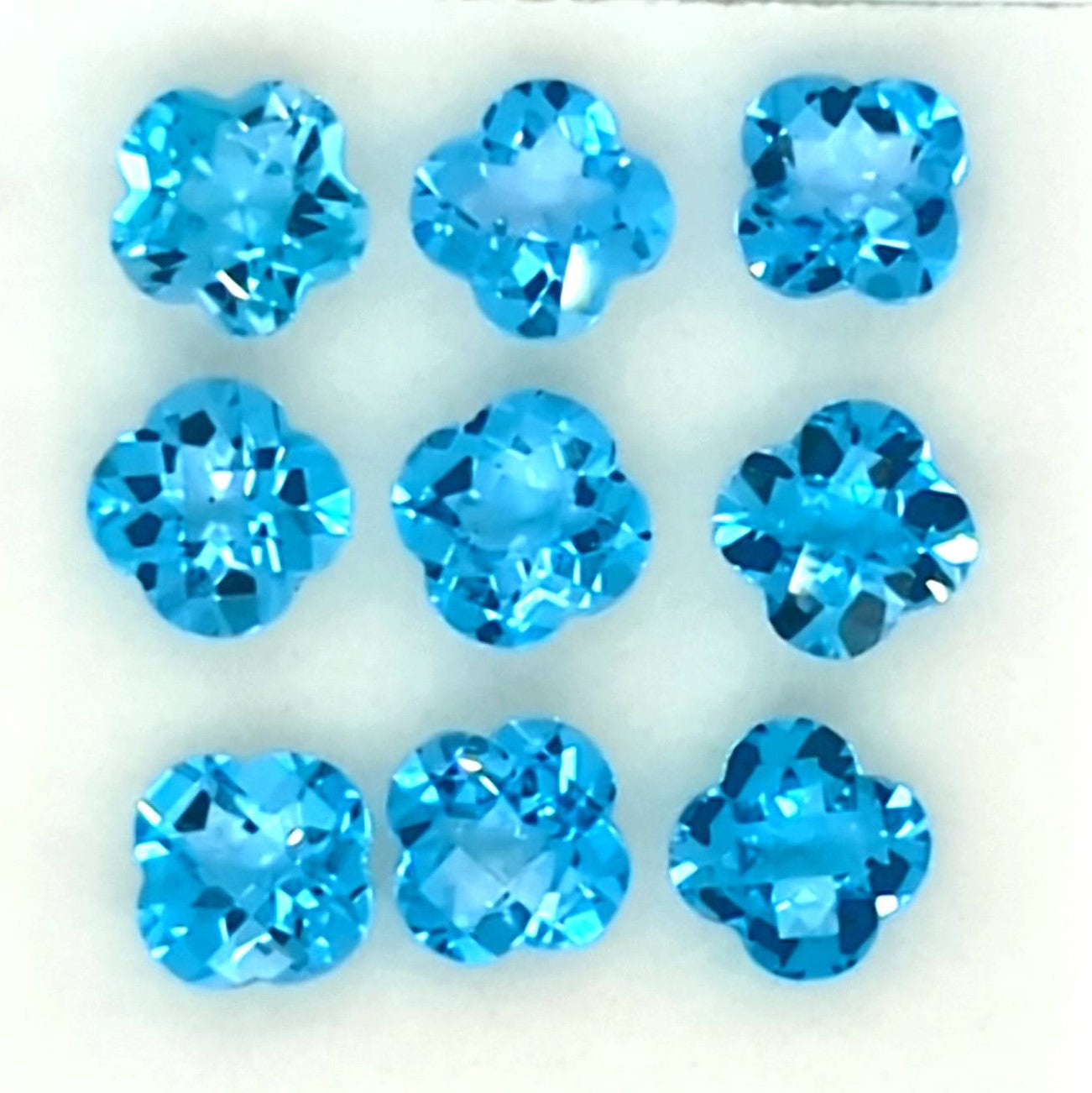 0.85ct Checkerboard Cut Flower Blue Topaz Gemstone