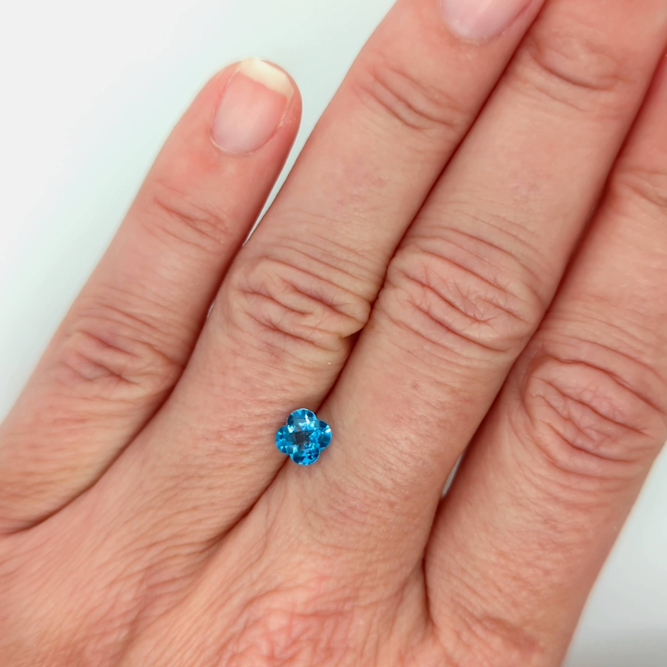 0.85ct Checkerboard Cut Flower Blue Topaz Gemstone