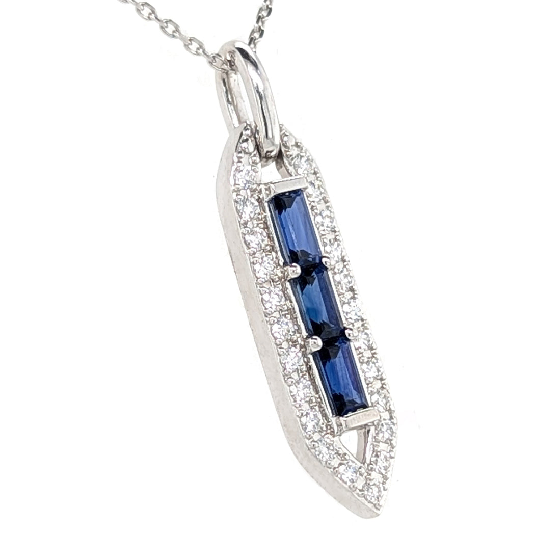 White Gold pendant with blue sapphire gemstones and clear diamonds on a white background