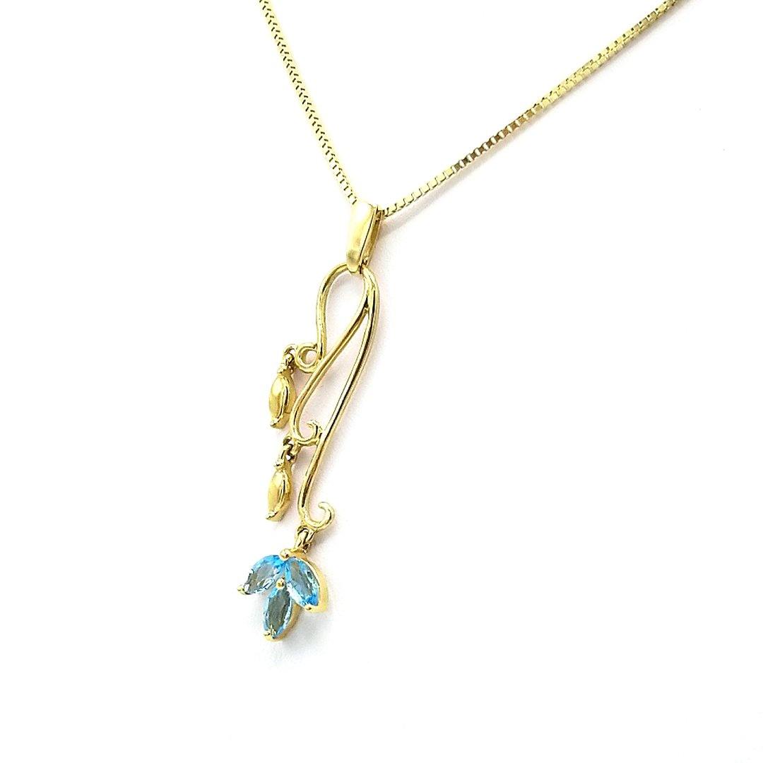 Elegant Nature-Inspired Blue Topaz Pendant in 10K Yellow Gold - The Rutile Ltd