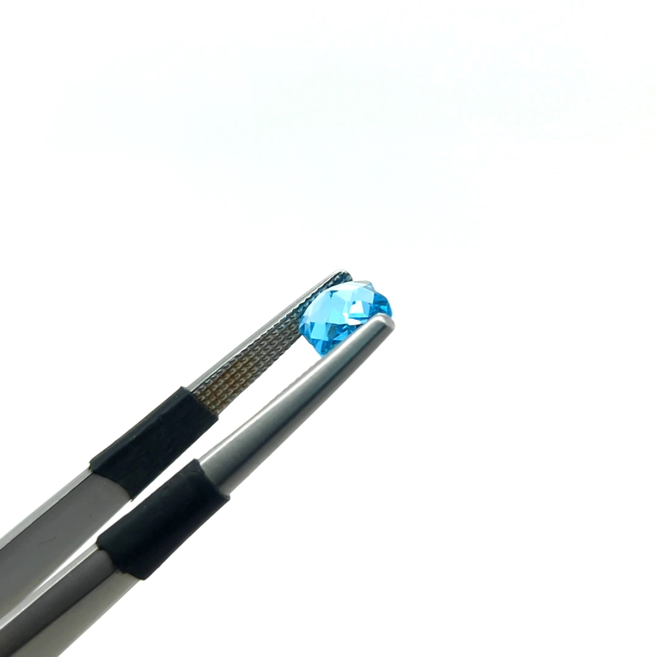 0.85ct Checkerboard Cut Flower Blue Topaz Gemstone