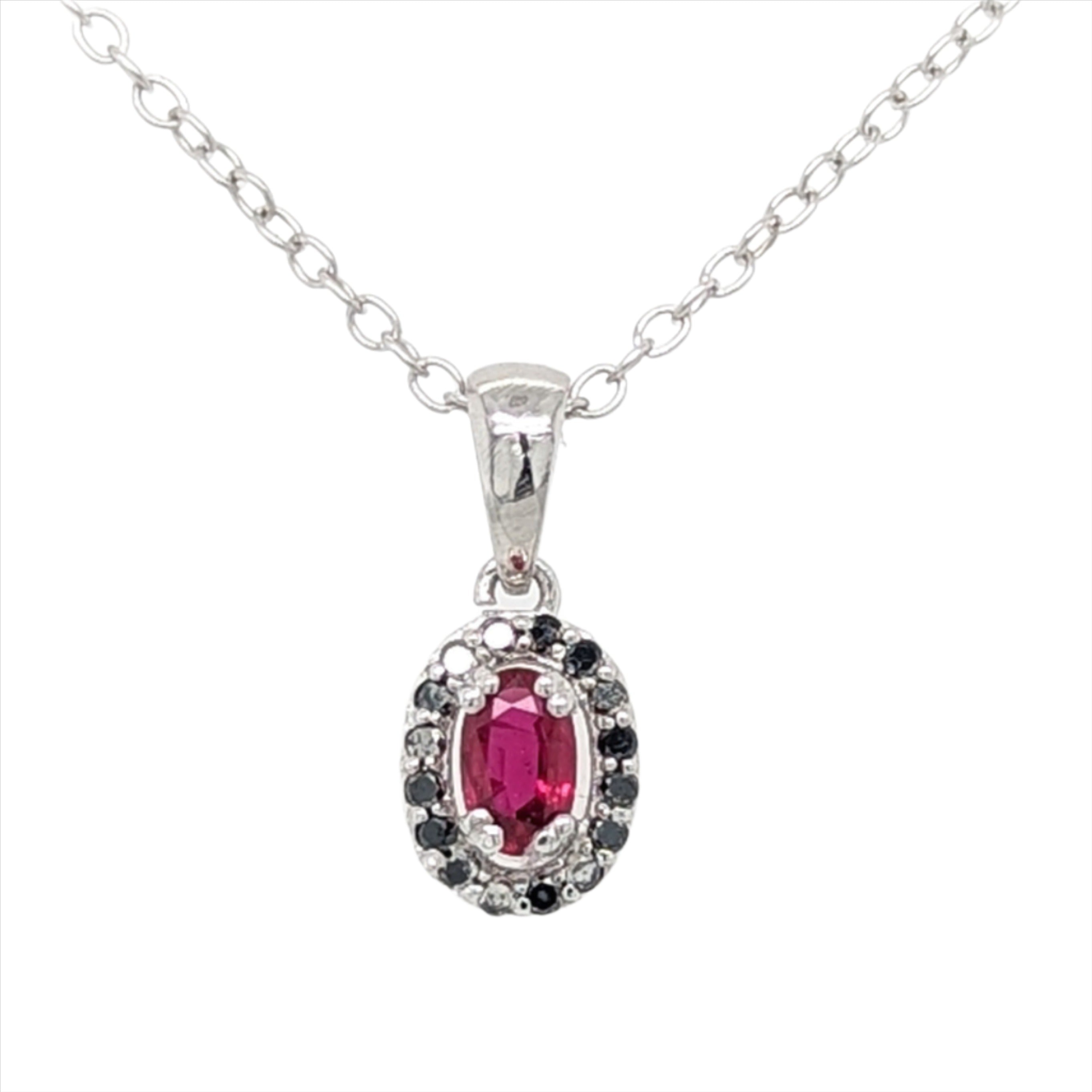 Ruby and Black Diamond Halo Pendant in 14kt White Gold