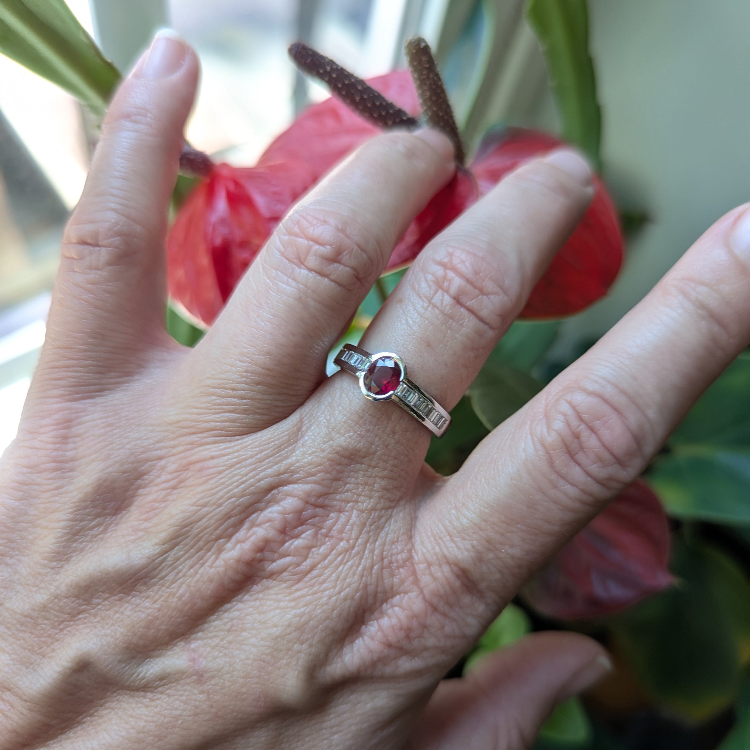 Bezel set Ruby and Baguette Diamond ring in 18kt white gold