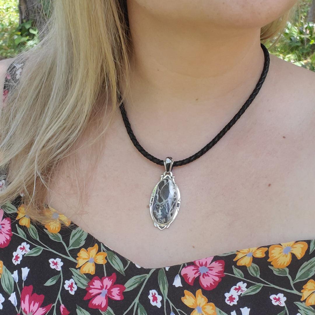 White Buffalo Turquoise Sterling Silver Pendant with Onyx Accents by Ed Lohman - The Rutile Ltd