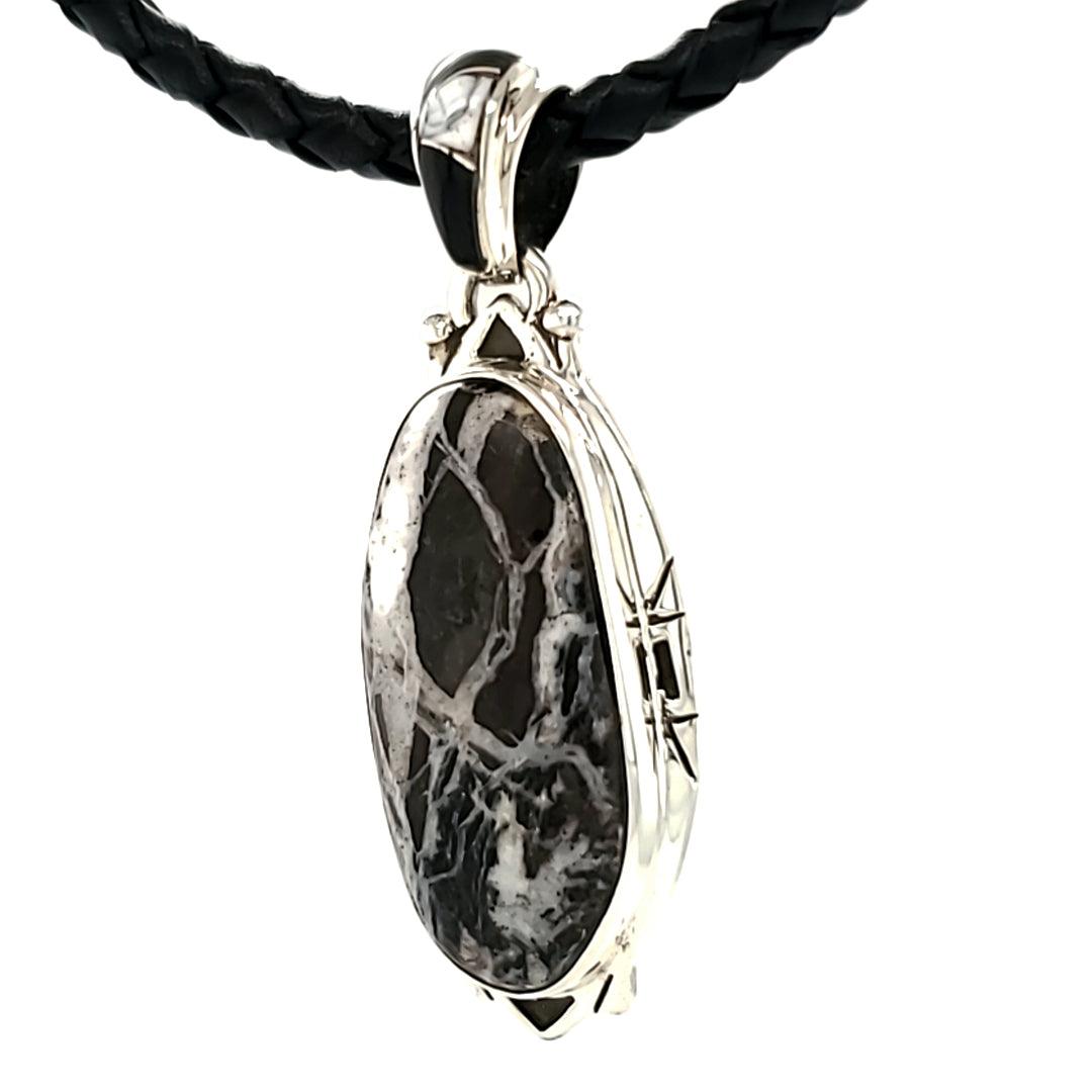 White Buffalo Turquoise Sterling Silver Pendant with Onyx Accents by Ed Lohman - The Rutile Ltd